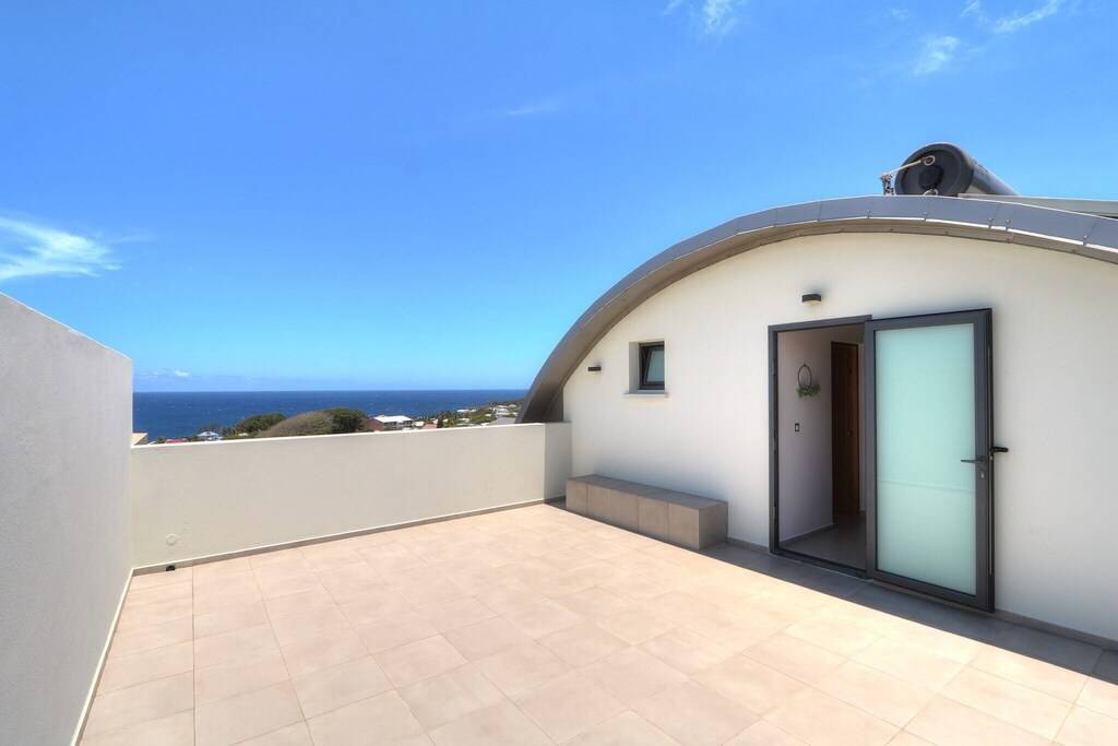 Terrasse rooftop privative avec espace détente